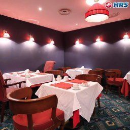 Salle du petit-déjeuner située dans le restaurant Villa Pantheon Fotos