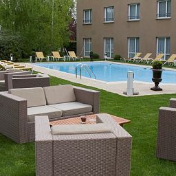 Сад Le Longchamp Best Western Fotos