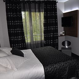 Номер Le Longchamp Best Western Fotos