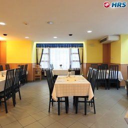 Breakfast room within restaurant City Hotel Ring Fotos