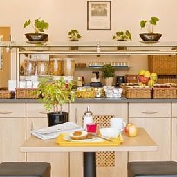 Breakfast room Ibis Budget Essen Fotos