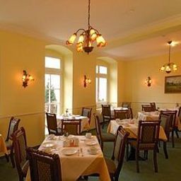 Salle du petit-déjeuner située dans le restaurant Myer's Fotos