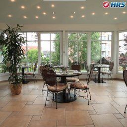 Sala de desayuno en el restaurante Schöngarten Garni Fotos