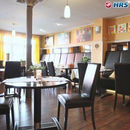 Frühstücksraum im Restaurant Ambiente Fotos
