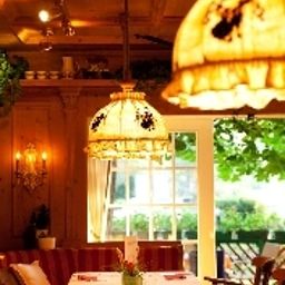 Salle du petit-déjeuner située dans le restaurant Jagdhof Fotos