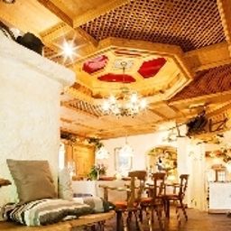 Salle du petit-déjeuner située dans le restaurant Jagdhof Fotos