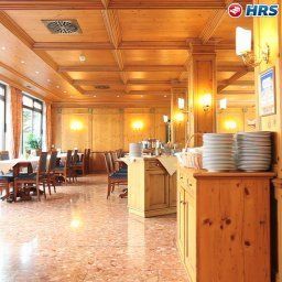 Salle du petit-déjeuner située dans le restaurant Kings Center Fotos