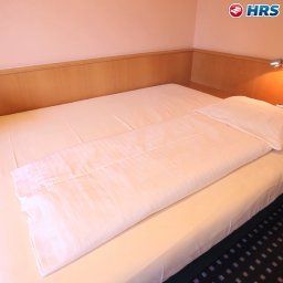 Pokój Commundo Tagungshotel Fotos