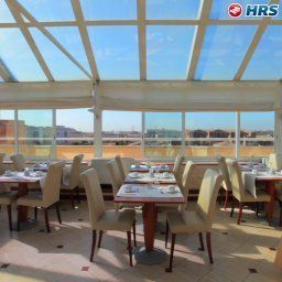 Salle du petit-déjeuner EXE  Domus  Aurea Fotos