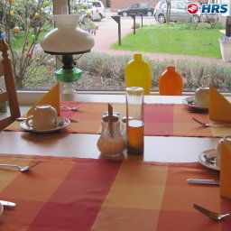 Breakfast room within restaurant Petersen Fotos