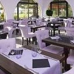 Salle du petit-déjeuner située dans le restaurant Ariane Fotos