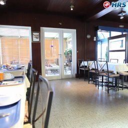 Salle du petit-déjeuner située dans le restaurant Balladins Tourotel Fotos