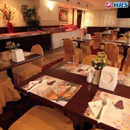Sala de desayuno en el restaurante Gunes Hotel Fotos