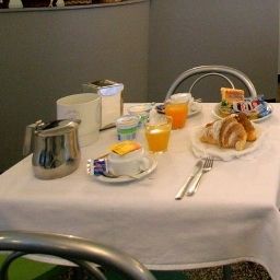 Salle du petit-déjeuner Assarotti Fotos