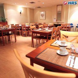 Sala de desayuno en el restaurante Hampshire Hotel - 108 Meerdervoort Fotos