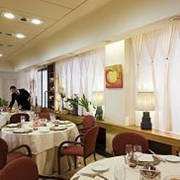 Salle du petit-déjeuner située dans le restaurant Art Hotel Museo Fotos
