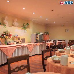 Salle du petit-déjeuner située dans le restaurant Fiamma Fotos