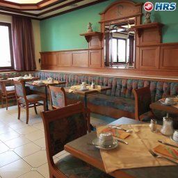 Sala de desayuno en el restaurante Das Reinisch Bed&Breakfast Airport Fotos