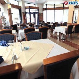 Salle du petit-déjeuner située dans le restaurant Astoria Fotos