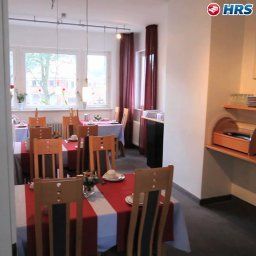 Salle du petit-déjeuner située dans le restaurant Am Wilden Eber Fotos
