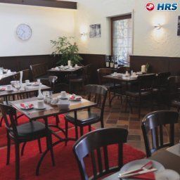 Salle du petit-déjeuner située dans le restaurant Hotel Mitte Alte Süsswarenfabrik Fotos
