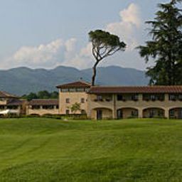 Vista exterior UNA Hotel Poggio dei Medici Golf & Resort Fotos