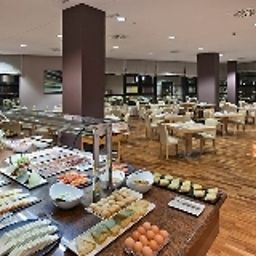 Salle du petit-déjeuner située dans le restaurant Confortel Pio XII. Fotos