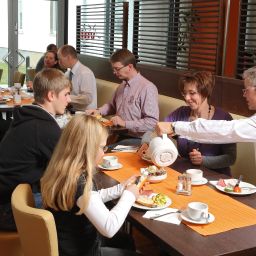 Breakfast room Global Inn Fotos