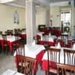 Sala de desayuno en el restaurante Stagnaro Fotos