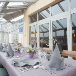 Sala de desayuno en el restaurante Stadt Püttlingen Fotos