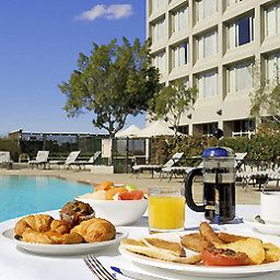 Sala de desayuno en el restaurante Mercure Sydney Parramatta Fotos
