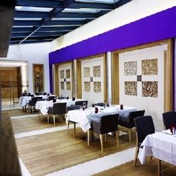 Breakfast room within restaurant Fliana Fotos