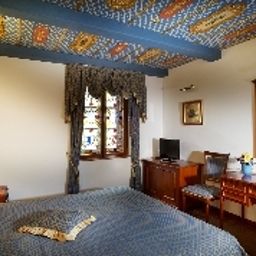 Habitación Royal Ricc Fotos
