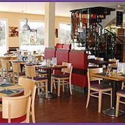 Salle du petit-déjeuner située dans le restaurant Hostellerie Saint-Vincent Citotel Fotos