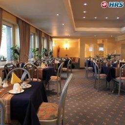 Salle du petit-déjeuner située dans le restaurant Allegro Fotos