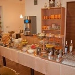 Salle du petit-déjeuner Zlami-Holzer Fotos