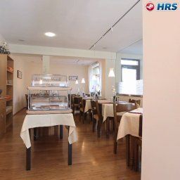 Salle du petit-déjeuner située dans le restaurant Zlami-Holzer Fotos