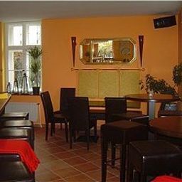 Sala colazione nel ristorante Apartment-Hotel Landhaus Lichterfelde Fotos