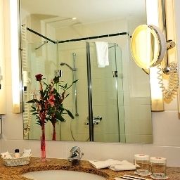 Ванная Ramada Plaza City Centre Hotel & Suites Fotos