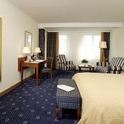 Номер Ramada Plaza City Centre Hotel & Suites Fotos