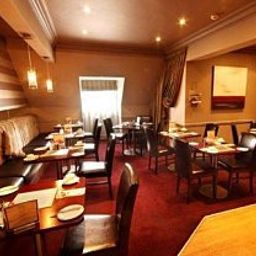 Salle du petit-déjeuner située dans le restaurant Waterside Hotel Fotos