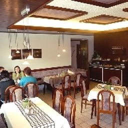 Sala colazione nel ristorante Sommer Pension Fotos