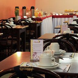 Salle du petit-déjeuner située dans le restaurant Mercure Porto Alegre Beverly Hills Hotel Fotos