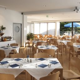 Комната для завтраков AllYouNeed Hotel Salzburg Fotos