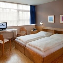 Номер AllYouNeed Hotel Salzburg Fotos