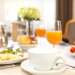 Salle du petit-déjeuner située dans le restaurant Am Paulusbogen Fotos