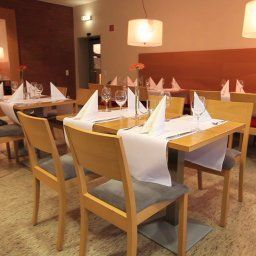Sala de desayuno en el restaurante FIT Freizeit- und Tagungshotel Fotos