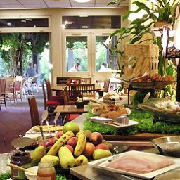 Sala colazione nel ristorante ibis Orange Centre Echangeur A7 A9 Fotos