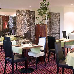 Salle du petit-déjeuner située dans le restaurant Mercure Angers Lac de Maine Fotos