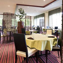 Salle du petit-déjeuner située dans le restaurant Mercure Angers Lac de Maine Fotos